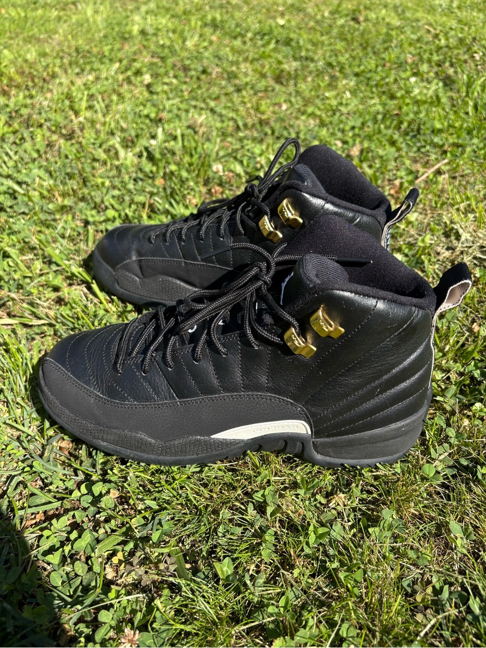 Black High-Top Basketball Sneakers with Gold Accents